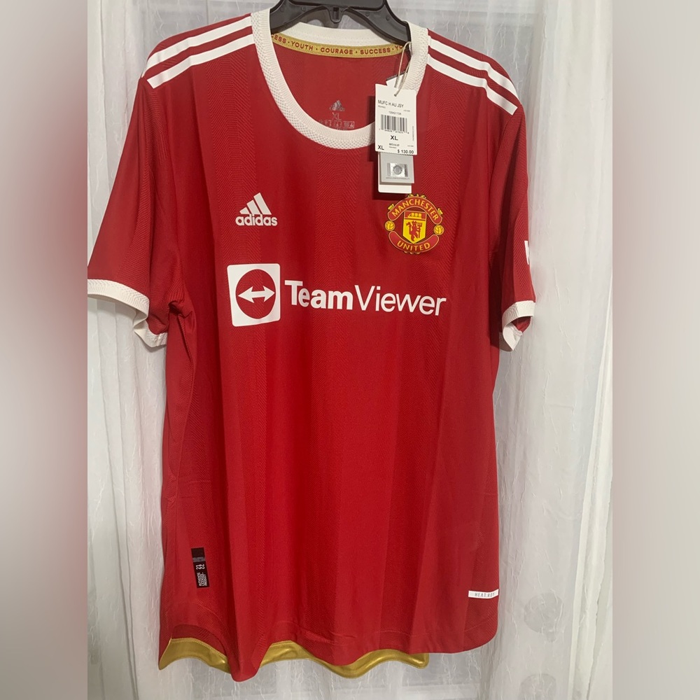 Authentic Manchester United Jersey NWT youth size XL.